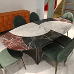 Patchwork Marble Dining Table with Flared Panel Legs and Textured Edge